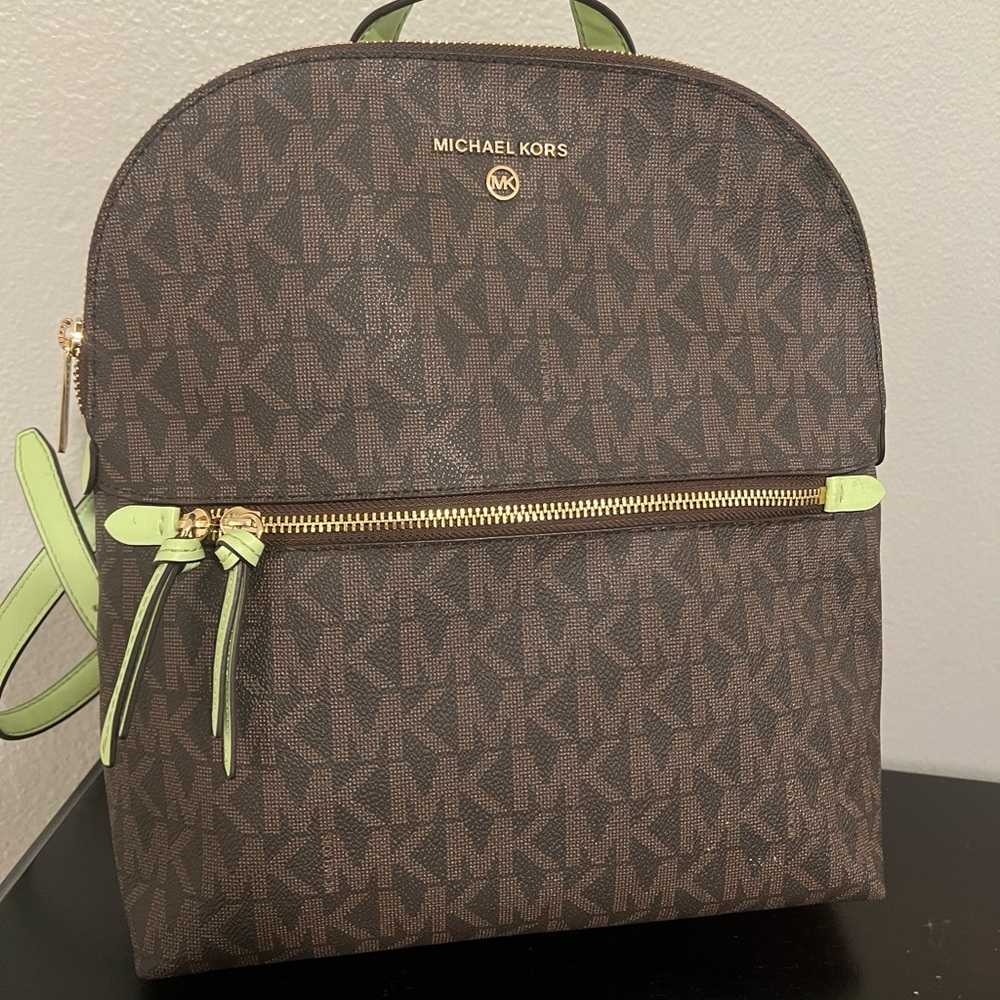 Michael Kors bag pack 
Green straps !
